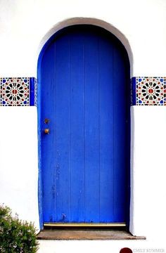 a blue and white door is shown in this image