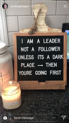 a sign that says i am a leader not a follower unless its a dark place you're going first