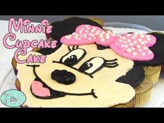 a minnie mouse cupcake cake on a plate