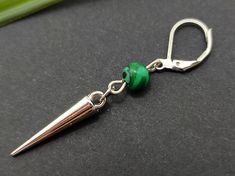 Malachite earrings, one men earring, green men earrings, long men dangle, guys earring, goth dangle, goth gift, boyfriend gift, spike earrings, silver spike dangle, green men gem, gem men dangle One  silver color acrylic spike dangle earring with round malachite bead 6 mm total length 2  Inches ( 5 cm ) Earrings are really lightweight and comfortable to wear.  Malachite helps the user acknowledge, draw out, and discharge negative energy, including old emotional patterns, past traumas, and suppre Gem Gem, Malachite Earrings, Color Acrylic, Gift Boyfriend, Spike Earrings, Men Earrings, Earrings Long, Green Man, Leaf Earrings