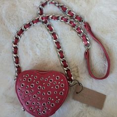 Beautiful Beautiful Purse. Sexy Red With Nice Shiny Silver Color Hardware. Suede Like On The Inside. Brand New With Tags. Message Me With Any Questions. Thanks For Looking! Red Shoulder Bag With Adjustable Strap For Valentine's Day, Valentine's Day Red Shoulder Bag With Adjustable Strap, Trendy Red Shoulder Bag For Valentine's Day, Chic Red Heart-shaped Bag, Trendy Red Heart-shaped Bag, Chic Shoulder Bag With Chain Strap For Valentine's Day, Heart-shaped Shoulder Bag With Chain Strap For Party, Chic Red Heart-shaped Shoulder Bag, Heart-shaped Party Shoulder Bag With Chain Strap