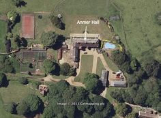 an aerial view of the house and grounds