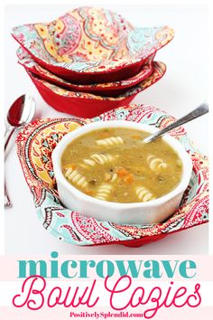 two bowls filled with soup on top of a table