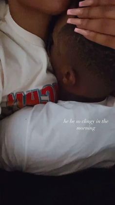 a woman holding a baby in her arms with the caption, he's so energy in the morning