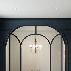 an arched doorway leading into a bathroom