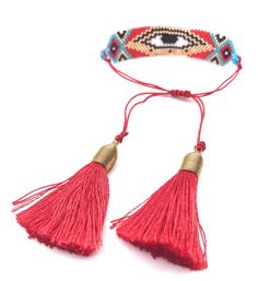 "Miyuki Bracelet Details: Handmade Woven Bracelet Adjustable from 5\" inches to 10\" inches Dimensions: 3.5\" x 0.75\" or 8.5 cm x 1.8 cm 2\" Red Silk Tassels. The tassels are wrapped with brass wire. This is a trendy piece to wear alone or with other bracelets. Each item is carefully shipped in a beautiful organza pouch, bubble wrapped and well protected." Beach Red Friendship Bracelets With Colorful Beads, Adjustable Beaded Bracelets With Tassels For Beach, Beach-friendly Red Colorful Beads Friendship Bracelets, Red Friendship Bracelets With Colorful Beads For Festival, Red Beaded Friendship Bracelets For Beach, Traditional Red Friendship Bracelets For Beach, Red Bohemian Evil Eye Bracelet For Festivals, Adjustable Red Friendship Bracelets With Colorful Beads, Red Bohemian Bracelet Beads