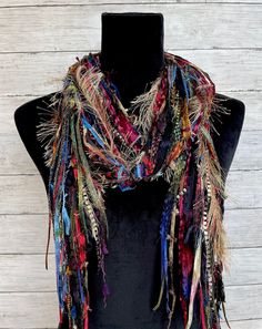 Multicolor Bohemian Scarves For Festivals, Bohemian Multicolor Scarf For Festivals, Bohemian Multicolor Scarves For Festival, Hippie Multicolor Festival Scarves, Hippie Multicolor Scarf One Size, Multicolor Tassel Shawl For Fall, Bohemian Fall Scarves With Tassels, Black Bohemian Scarf For Fall, Multicolor Tassel Shawl For Festival