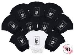 twelve black and white shirts with the number thirteen on them, all in different styles