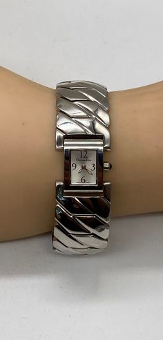 "Beautiful Pre/owned Christian Dior Swiss Made Classic Stainless Steel Ladies Quartz Watch Good Working Condition New Battery Installed and Keeps Good Time Measures 6.5\" inside diameter when close and band is 7/8\" width and the case measures 20mm. X 13mm. with the crown." Dior Watch, Blue Christmas Tree, Ladies Watch, Swiss Made, Watch Collection, Wrist Watches, Good Time, The Crown, Ice Blue