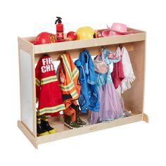 a toy fireman's coat rack with clothes and hats on display in front of a white background