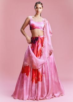 Fondant pink satin water colored lehenga with a back drawstring blouse and an organza dupatta embellished with bead and sequin. Floral Print Lehenga, Dolly J, Fondant Pink, Print Lehenga, Lehenga Pattern, Pink Lehenga, Watercolor Floral Print, Beaded Neckline, Organza Dupatta