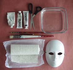 the supplies needed to make a mask are laid out