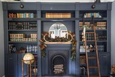 a living room filled with furniture and a fire place