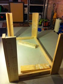 an unfinished chair sitting on top of a hard wood floor