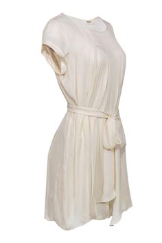 Grab this sheer, dreamy dress today from L'Agence for some romance! Made with a pleated design, this is a belted beauty to wear with strappy sandals, golden accessories and your favorite nude lipstick. Go on and be a bit angelic! Size 2 100% Silk Rounded neckline Shift silhouette Short sleeve Tied belt included Pleated front design Sheer material with slip dress Waist 34" Bust 36" Total length 35.5" Elegant Belted Pleated Dress For Formal Occasions, Chic Pleated Waist Dress For Day Out, Elegant Beige Belted Dress, Elegant Daywear Dress With Belt, Elegant Fitted Belted Pleated Dress, Elegant Spring Belted Pleated Dress, Elegant Flowy Pleated Dress, Elegant Dress With Pleated Waist For Day Out, Elegant Day Out Dresses With Tie Waist