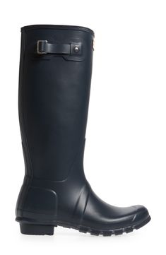 A classic finish perfects a puddle-proof rubber boot finished with a traction-gripping sole. Subtle tonal motifs circle the shaft, while an adjustable buckle at the side adds interest. Waterproof: protects against rain, puddles and slush to keep feet dry in wet conditions 1 1/2" heel height (size 9) 16" boot shaft height; 15 1/2" calf circumference In hot or humid weather, natural latex rubber releases a protective wax film; simply wipe it off with a damp cloth A pristine finish and shine is eas Classic Round Toe Boots For Rainy Weather, Classic Waterproof Rain Boots For Rainy Weather, Classic Waterproof Rain Boots With Round Toe, Classic Waterproof Rain Boots, Rain Boots Women, Humid Weather, Hunter Rain Boots, Rubber Boot, Rain Boot