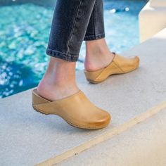 Talulah is the brand new, unique styling of our classic mule. Sleek and slip-on, the mule features milled nubuck uppers in a variety of chic colors. Soft leather linings provide added comfort, while our signature contoured footbed with added memory foam creates support for the whole day. A lightweight, shock absorbing PU midsole and a rubber outsole will help Talulah last from season to season. Classic Closed Toe Mules With Cushioned Footbed, Classic Leather Slip-on Clogs, Spring Everyday Clogs With Cushioned Footbed, Modern Slip-on Clogs With Stitched Sole, Spring Clogs With Cushioned Footbed For Everyday, Everyday Leather Sole Clogs, Classic Slip-on Clogs With Stitched Sole, Classic Slip-on Clogs With Rubber Sole, Slip-on Clogs With Stitched Sole And Closed Toe