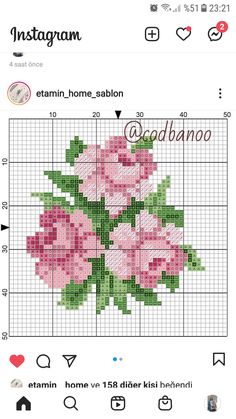 a cross stitch pattern with pink flowers on it