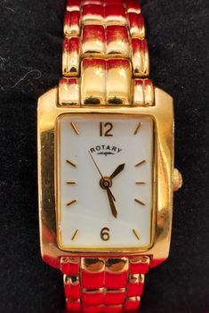 Cocktail style Rotary Ladies watch  Model:10611 Movement: Japanese Quartz mechanism  New battery  Case shape rectangular  Case measure with crown:21mm/24mm White dial with golden tone indexs  2 golden tone hands  Special function: Secondary hand golden tone The watch will be fit for wrist max size 17,5 cm Very good used condition  Working perfectly  Included luxury box with velvet pillow Luxury Boxes, Watch Model, Ladies Watch, Velvet Pillows, White Dial, Wrist Watches, Bulgaria, Womens Watches, Wrist Watch