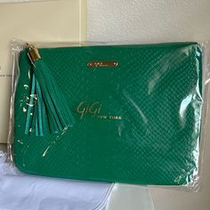 Gigi New York | All In One Bag - Green Embossed Python Leather Fashionable Clutch, Yet Slim Enough To Slip Into Your Favorite Purse, All In One Bag Is The Ideal Everyday Pouch. - Top Zipper Closure - Interior Slip Pocket - Signature Gold Tassel Cap - Handcrafted - Size: 9 ½" W X 7" H *Bag Is Brand New In Original Packaging (As Pictured). Dust Bag Is Included. Green Shoulder Bag With Gold-tone Hardware For Evening, Green Clutch Bag With Zipper Closure, High-end Green Bags With Gold-tone Hardware, Green Clutch With Gold-tone Hardware, Green Leather Bag With Gold-tone Hardware, Favorite Purse, Bag Green, One Bag, Green Bag