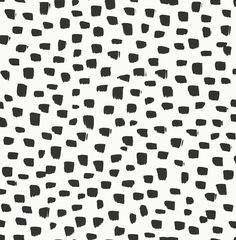 an abstract black and white background with small squares on the bottom half of the image