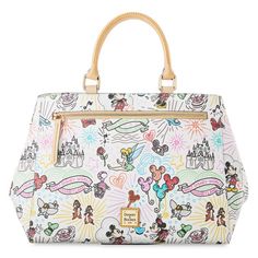 a handbag with mickey mouse and other cartoon characters on the front, in white