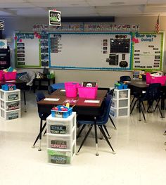 an empty classroom with desks and chairs