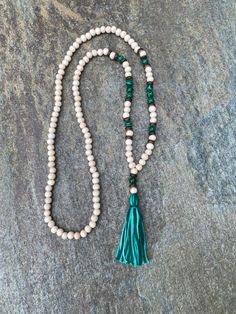 Natural wooden beads (8mm) malachite gemstone beads coconut beads multicolored, 100% cotton tassel This necklace measure 36 inches. Total hanging length from nape of neck to end of tassel is 21.5 inches. the beads & tassel at the end of the necklace measures 3.5 inches. The tassel is 2.5 inches Other styles available 😀😀 Please take a few moments to browse through my shop. I have a large selection of unique belt bucks, leather belt straps & jewelry available. https://www.etsy.com/listin Bohemian Wooden Beads Tassel Necklace Gift, Bohemian Tassel Necklace With Wooden Beads For Gift, Bohemian Natural Jewelry With 8mm Beads, Bohemian Natural 8mm Bead Jewelry, Natural Bohemian Jewelry With 8mm Beads, Beaded Tassel Necklace, Mens Necklace, Wood Bead Necklace, Nape Of Neck