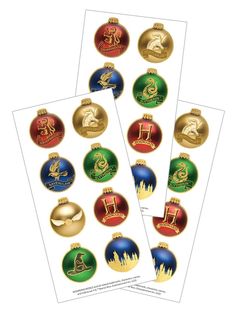 3 sheets of harry potter stickers featuring colorful Christmas ornaments decorated in gold with Hogwarts house symbols, shown on white background. Sticker Planet, Harry Potter Christmas Decorations, Harry Potter Ornaments, Personalized School Supplies, Harry Potter Hogwarts Houses, Harry Potter Stickers, Christmas Houses, Harry Potter Christmas, Paper House