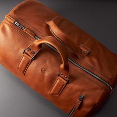 Substantial Leather Duffle Bag · Tan by Capra Leather Men's travel overnight bag design. product design made with full grain leather and linen interior. Unique color bag for men Duffle Bag Men, Leather Duffle Bag Men, Mens Duffle Bag, Leather Duffel Bag, Leather Weekender Bag, Leather Duffel, Leather Backpacks, No Thanks, Backpack Pattern