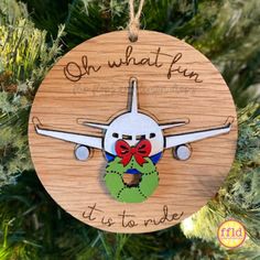 a wooden ornament with an airplane on it