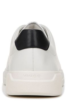 A low-top sneaker is textured with perforations and cushioned by a padded collar for all-day comfort. Leather upper/synthetic lining/rubber sole
 Imported Low-top Perforated Slip-on Sneakers For Sports, Sporty Synthetic Sneakers With Perforations, Modern Low-top Slip-on Sneakers With Perforations, Casual Low-top Golf Shoes With Textured Sole, Sporty Synthetic Slip-on Sneakers With Perforations, Urban Synthetic Sneakers With Branded Insole, Synthetic High-top Sneakers With Perforations And White Sole, Synthetic High-top Sneakers With Perforations For Light Sports, White Low-top Golf Shoes With Textured Sole