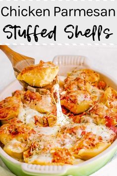 chicken parmesan stuffed shells in a green casserole dish with a wooden spoon