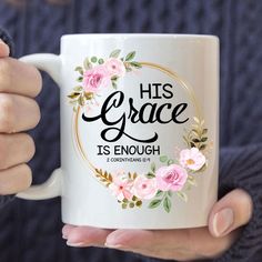 a woman holding a coffee mug with the words his grace is enough