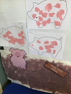 paper cut out of pigs and piggies on a table with other pieces of paper