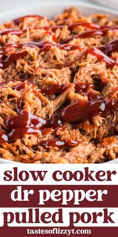 slow cooker dr pepper pulled pork in a white bowl with bbq sauce on top