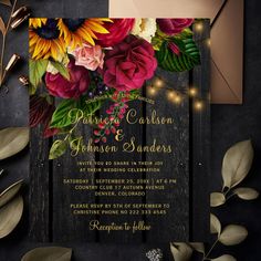 a wedding card with flowers and lights on it