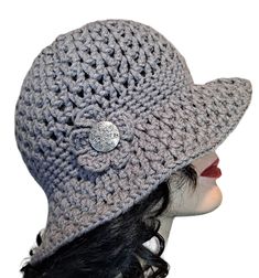 Crochet floppy hat with side button on side. Hat is made with 100% acrylic yarn. One size fits most. Machine or hand wash. Dry flat. Acrylic Yarn, Handmade Crochet, Floppy Hat, Fiber Art, Hand Wash, Yarn, Crochet, Hats, Fibre Art