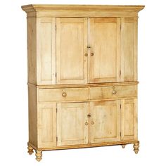 a wooden cabinet with two doors and drawers