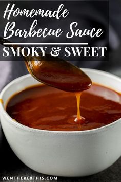 homemade barbecue sauce in a white bowl with a spoon full of bbq and sweet