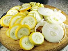 sliced onions and onion on a cutting board