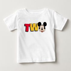 a mickey mouse t - shirt with the word wt on it