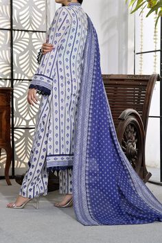 DESCRIPTION: TOP QUALITY THREE PIECE PRINTED LAWN DRESS WITH LAWN DUPATTA. 2.75 Mtr Printed Lawn Fabric For Shirt. 2.25 Mtr Printed Lawn Dupatta. 2.5 Mtr Printed Trouser NOTE: Due to use of heavy flashlights while photo shoot, actual color of dress will vary 10-15% "TO PLACE ORDER ON WHATS'APP " "CLICK HERE" Cambric Dresses With Printed Motifs For Wedding, Blue Digital Print Dress For Wedding, Fitted Cambric Wedding Dress, Blue Wedding Dress With Digital Print, Elegant Printed Wedding Dupatta, Elegant Printed Dupatta For Eid, Fitted White Cambric Lawn Suit, Elegant Blue Dresses With Naqshi Detailing, Formal Long Sleeve Digital Print Dress