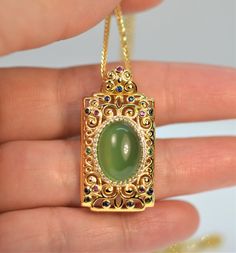 "🌹 Welcome to JeansJewelryStudio! 🌹 https://www.etsy.com/shop/JeansJewelryStudio DESCRIPTION Beautiful vintage style filigree design pendant necklace! The unique stylish design uses gold vermeil, 18k gold over solid 925 sterling silver, an apple green Chrysoprase bead, and tiny tourmaline beads. The chain is gold vermeil too, perfect for sensitive skin.  Metal: Gold vermeil, gold over sterling silver Pendant Dimensions: Approx. 1 5/16 \" x 11/16\"  Natural Chrysoprase: Approx. 14 mm x 10 mm Green Cabochon Emerald Necklace For Gift, Green Cabochon Emerald Necklace Gift, Filigree Necklaces, Vintage Style Jewellery, Tourmaline Beads, Vermeil Jewelry, Filigree Design, Onyx Bead, Green Onyx