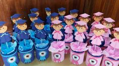 a group of children's graduation hats and boots with paper cutouts on them