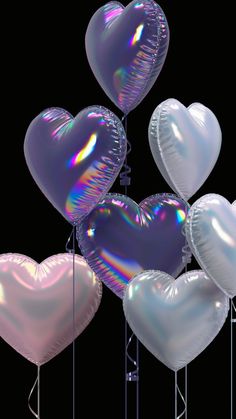 many shiny heart shaped balloons are in the shape of an x - ray mirror ballon