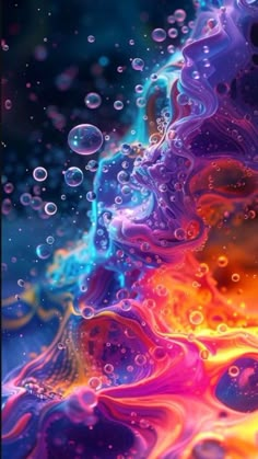 an image of colorful bubbles in the water