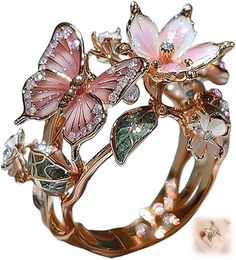 PRICES MAY VARY. 💗💗Exquisite Butterfly Flower Ring: Our Butterfly Flower Ring, made of high quality titanium steel, pearls and epoxy resin, combines elegance and durability. Its corrosion resistance and anti-allergy properties ensure easy maintenance and long-lasting beauty. The enchanting color of the ring changes with the light, adding a touch of mystique to any outfit. 💗💗. Adjustable Design for Perfect Fit: The Butterfly Flower Ring features an adjustable design, allowing it to be resized Butterfly Flower, Butterfly Flowers, Flower Ring, Beautiful Butterflies, Special Gift, Ideal Gift, Special Gifts, Butterflies, Jewelry Collection