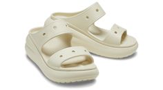 For a fresh new take on your favorite sandal, look to the Classic Crush Sandal. Featuring added height and a bold design, this dynamic new sandal features the popular and versatile two-strap design, plus Jibbitz™ holes on the sandal straps for personalization. The Crocs comfort you love, plus an extra dose of height, attitude, and style.  Crush Sandal Details:    Stylish two strap design  Unique 2-inch / 5.4cm height, measured from floor to heel rest  Customizable with Jibbitz™ charms  Iconic Cr New Sandal, Crocs Clog, Flexible Shoes, Love Plus, Style Crush, Strap Design, Bold Design, Style Classic, Comfortable Shoes