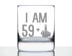 a shot glass with the words i am 39 plus on it